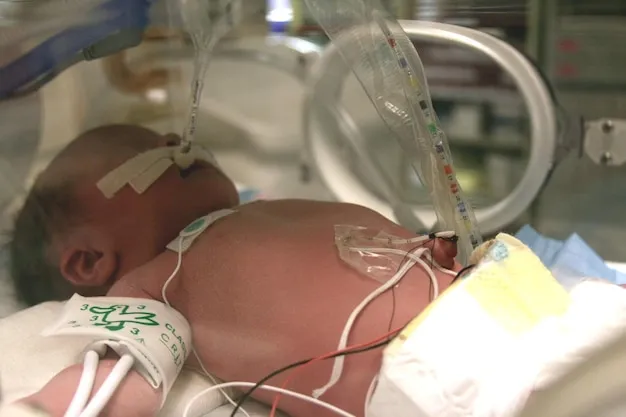 Close-up of baby in incubator