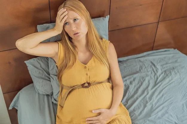 Expectant woman experiences discomfort feeling unwell during pregnancy