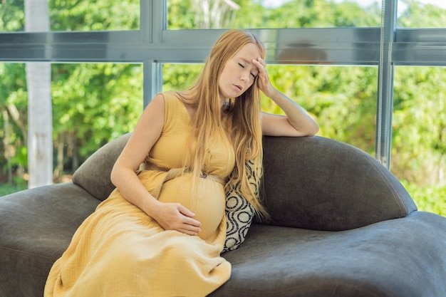 Expectant woman experiences discomfort feeling unwell during pregnancy