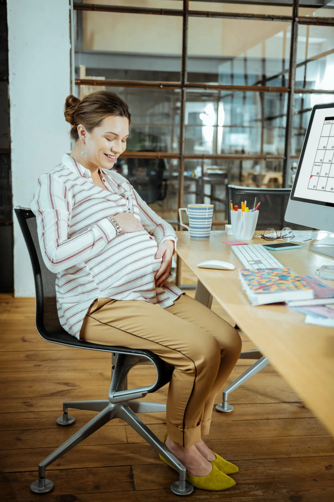 Extremely excited. Pregnant beautiful woman feeling extremely excited before giving birth