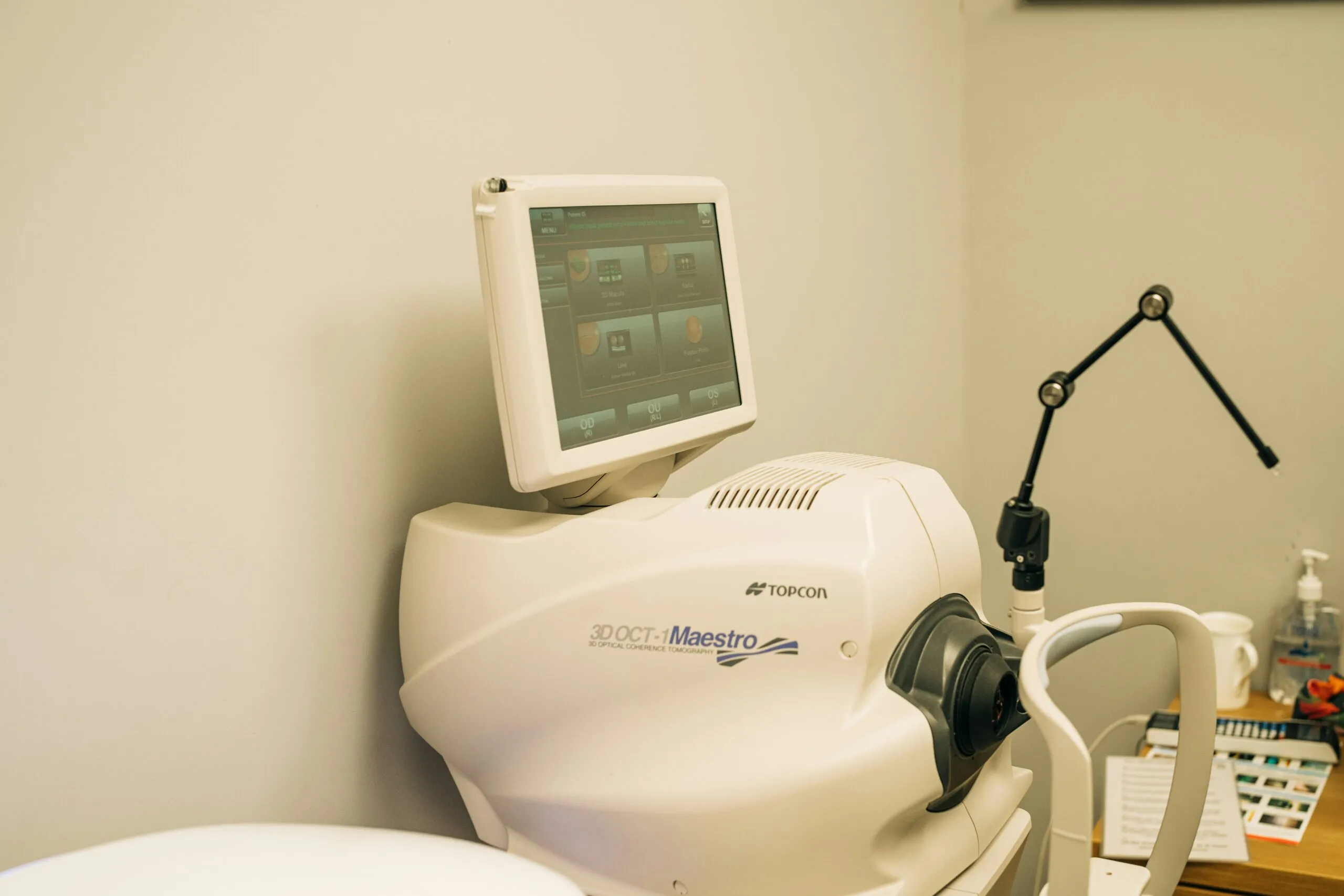 a computer monitor mounted to the side of a wall