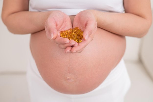 Midsection of woman holding hands