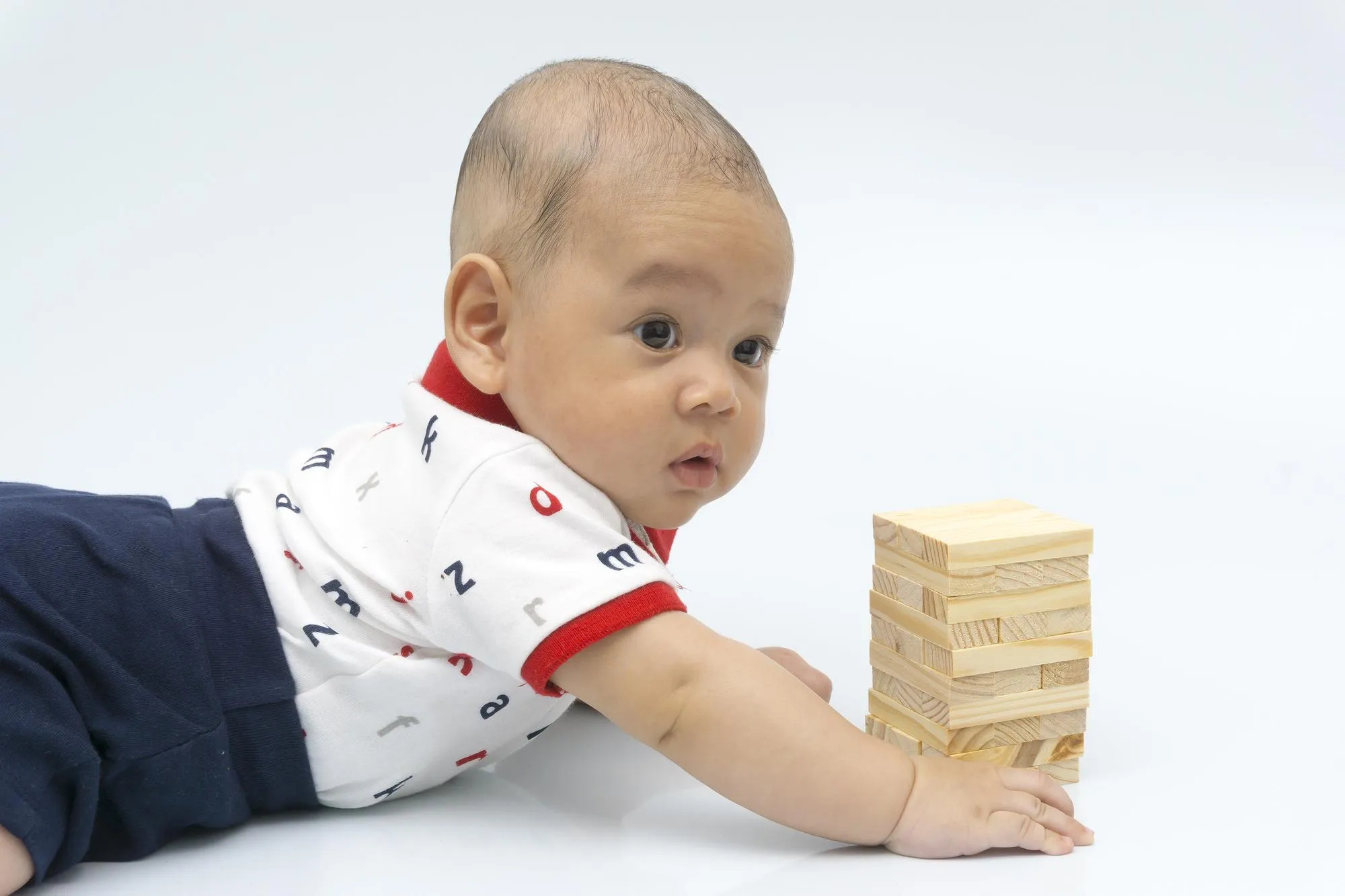 Portrait of boy against white background