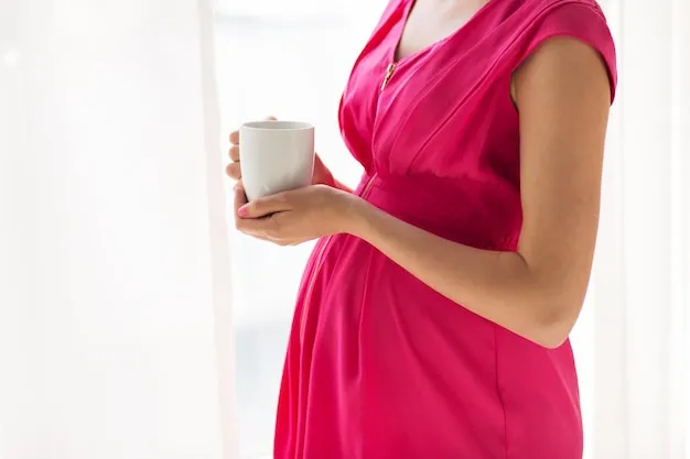 pregnancy, drinks, rest, people and expectation concept - close up of pregnant woman with cup drinking tea at home