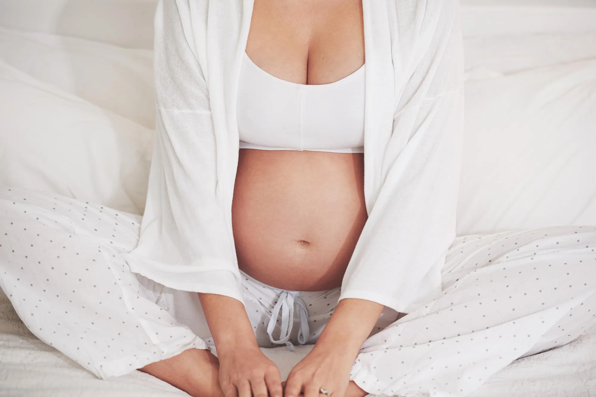 Pregnant mama or sitting in maternity bed or thinking of health wellness or peace in home Pregnancy woman or rest to hope imagine or break of future motherhood or idea of maternal comfort