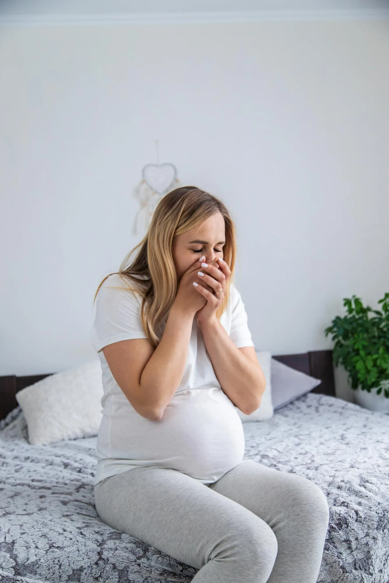 A pregnant woman is sick of toxicosis Selective focus