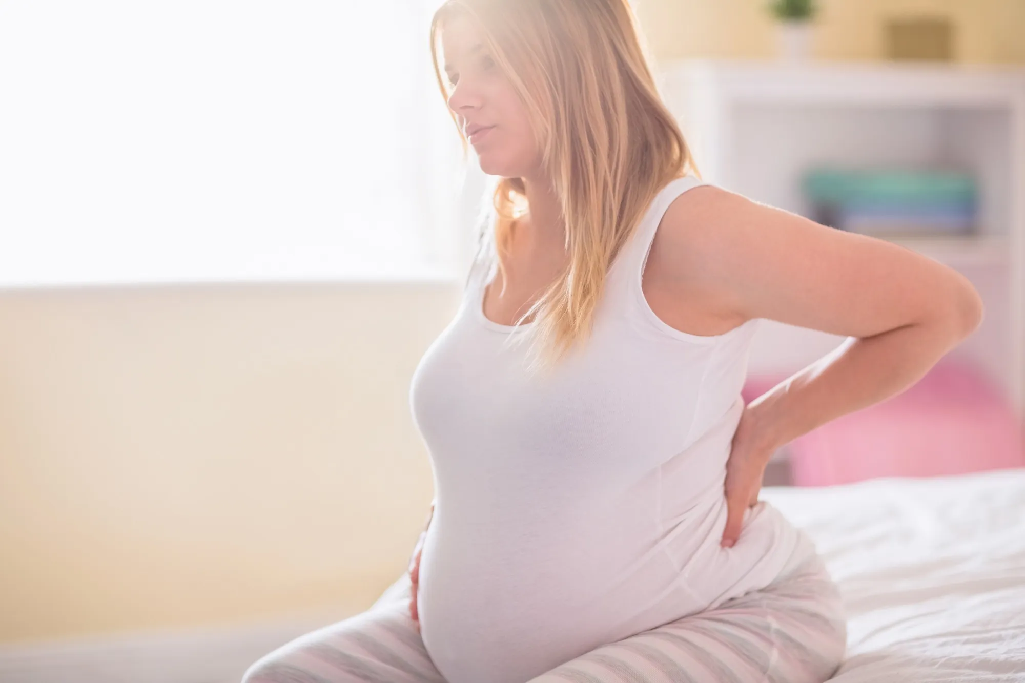 Pregnant woman with back pain 