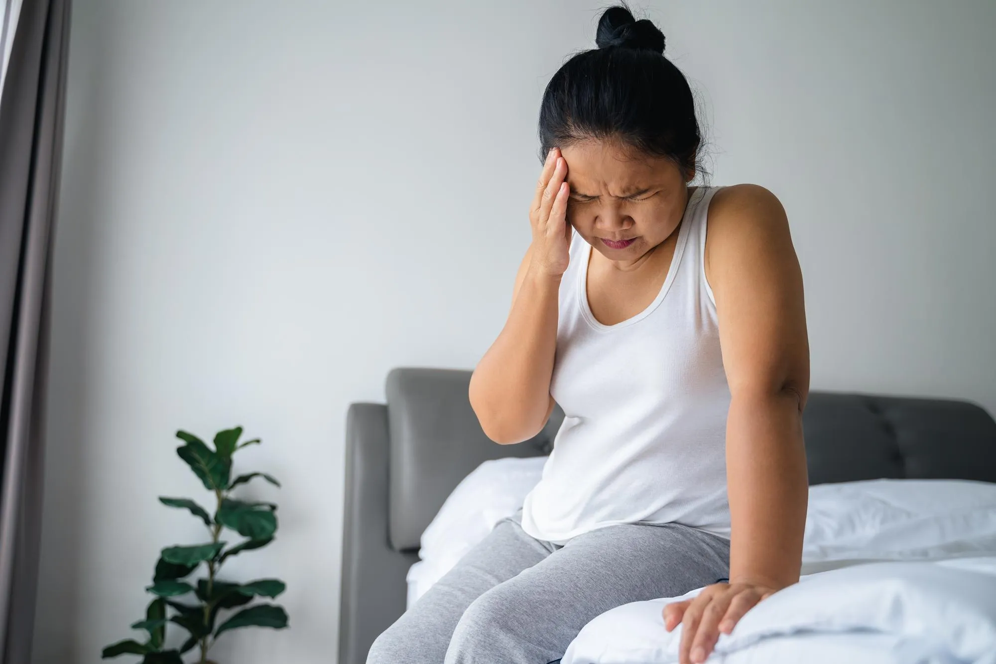 stressed mature woman suffering from headaches Brain diseases mental problems Alzheimer Concept