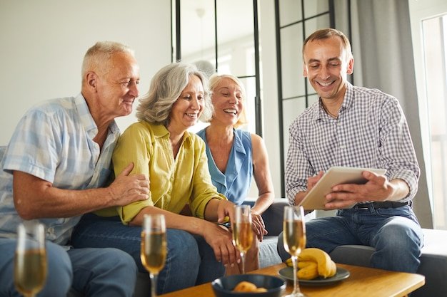 Senior People Watching Videos via Tablet