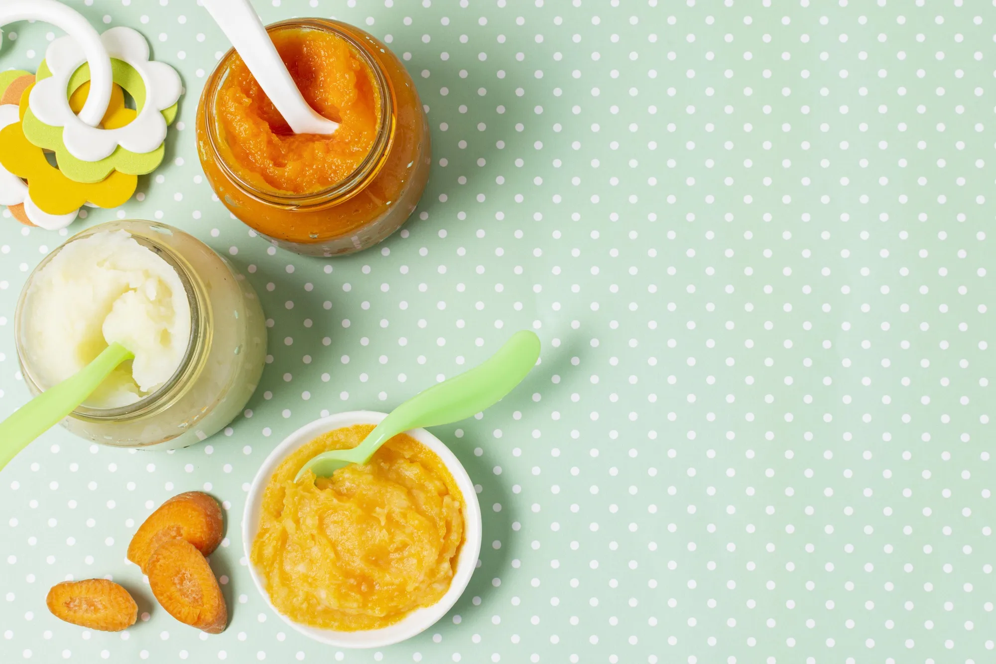 Top view bowl and jars with baby food